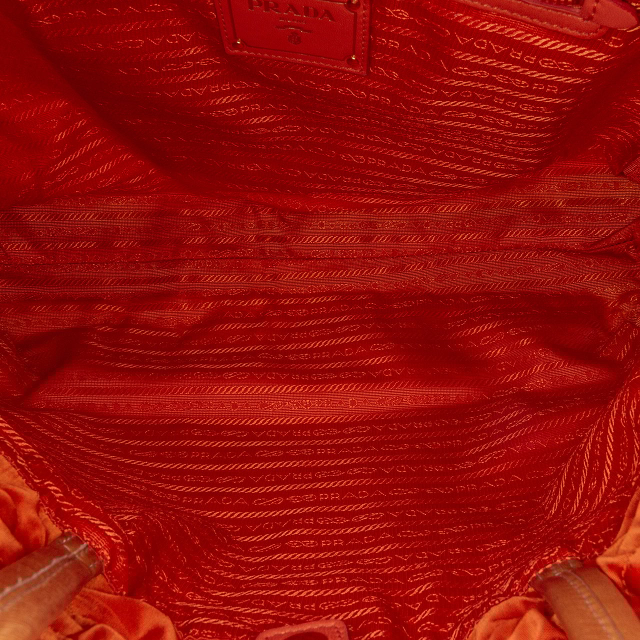 Prada Tessuto Logo Drawstring Tote Oranje