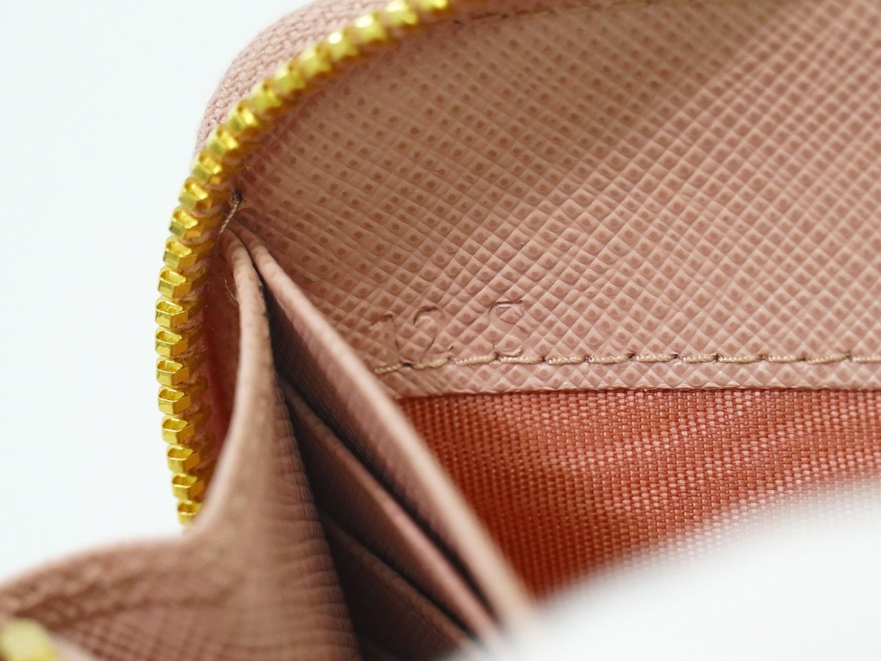 Prada Prada Bow Zip Around Wallet Saffiano Leather Long Roze