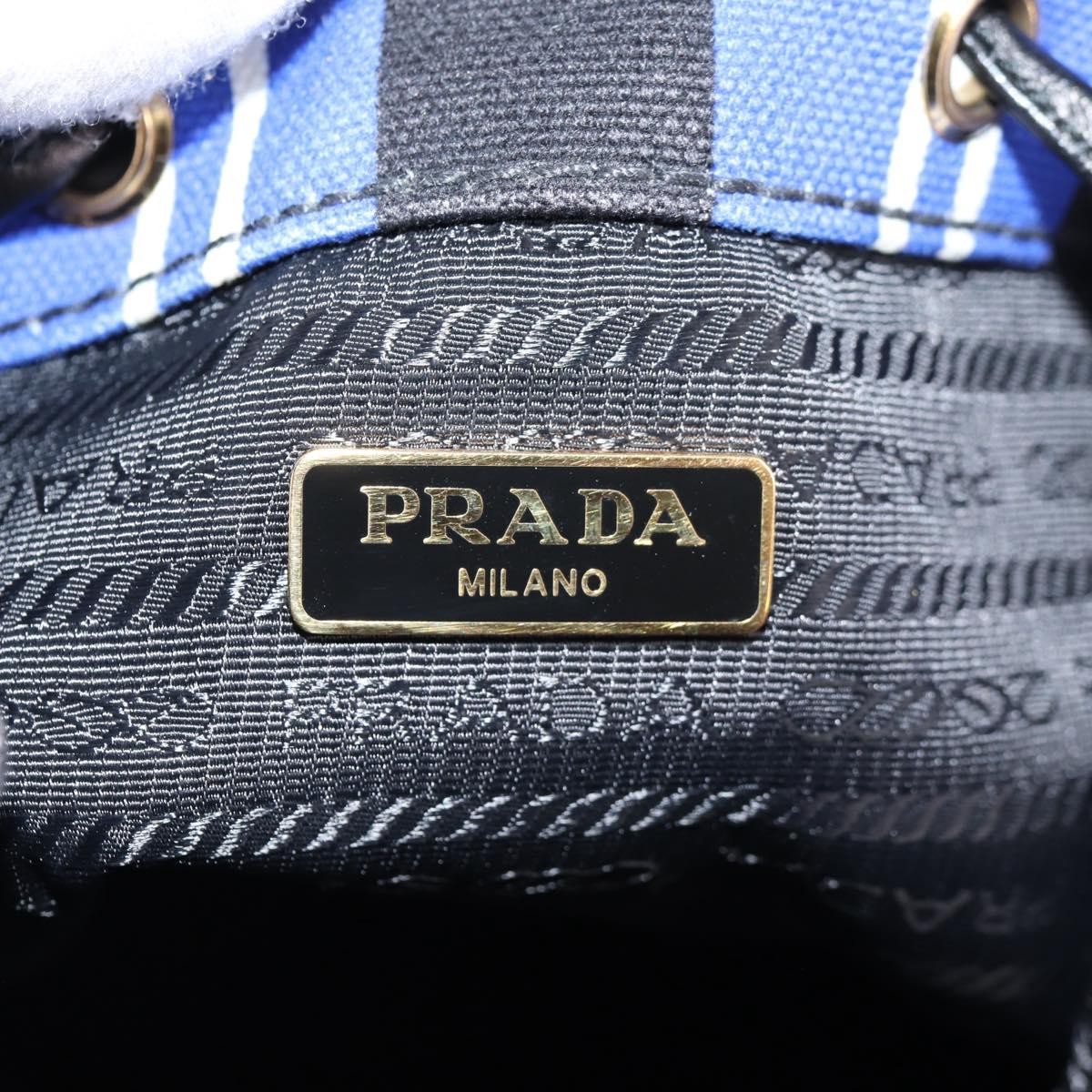Prada Prada Drawstring Bucket Bag Canvas and Wicker Small Blauw
