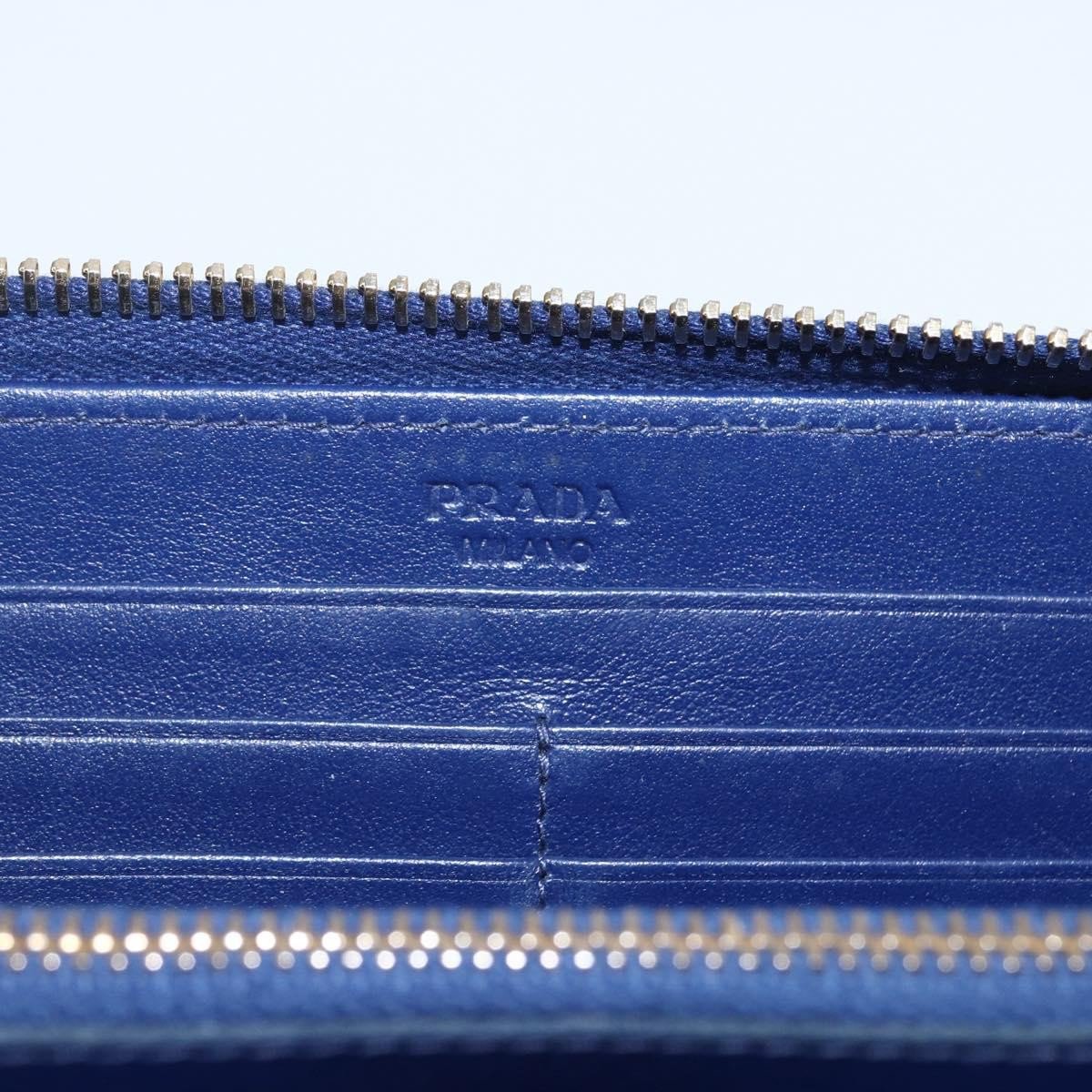 Prada Prada Zip Around Organizer Wallet Saffiano Leather with Applique Blauw