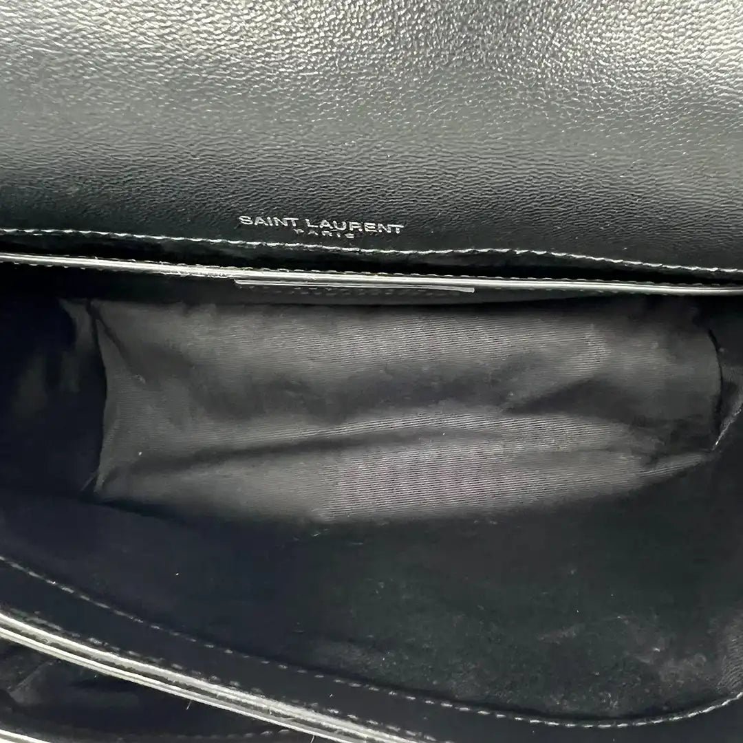 Saint Laurent Saint Laurent Niki Baby shoulder bag in black patent leather / very good Zwart