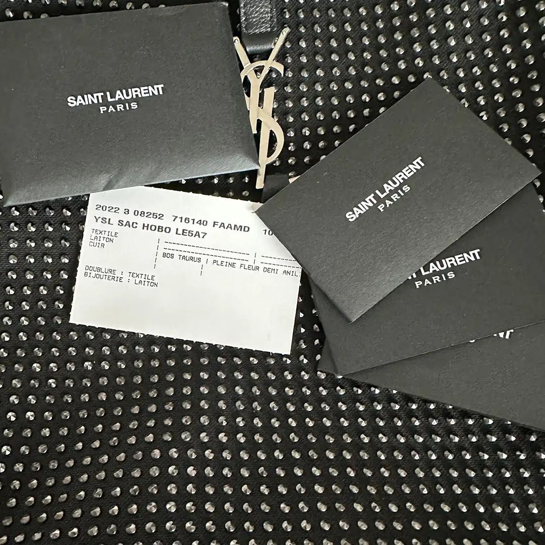 Saint Laurent Saint Laurent medium hobo bag LE 5 À 7 black rivets / mint condition Zwart