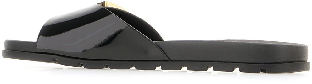 Tory Burch Black rubber slippers Zwart