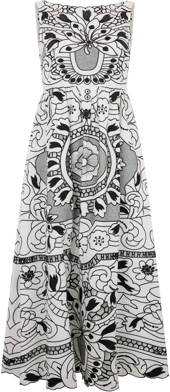 Valentino Elegant dress without sleeves in white color with black print. Wit