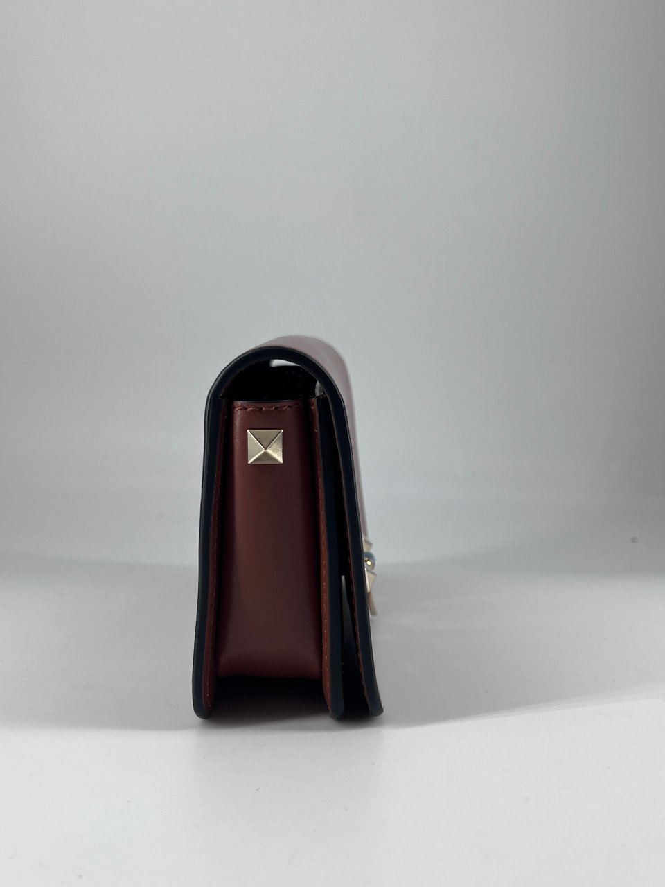 Valentino Garavani Valentino Garavani Rockstud Flip Lock Flap Bag Leather Small Bruin