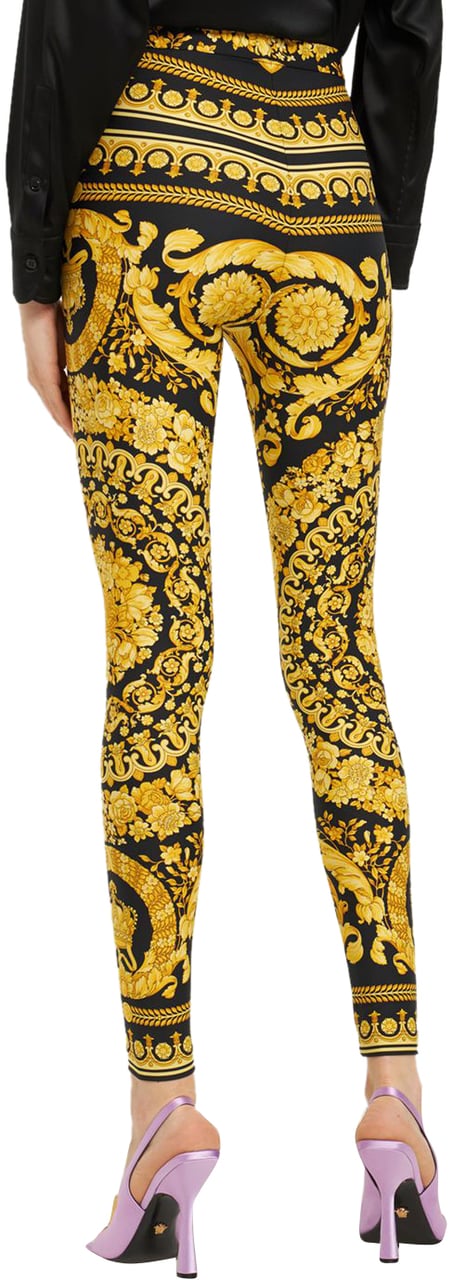 Versace Printed leggings with logo Goud