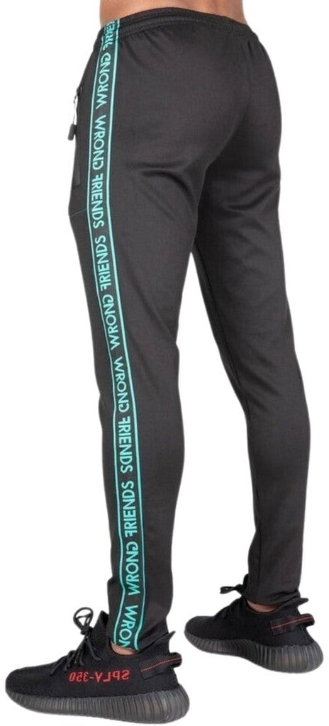 Wrong Friends LYON TRACK PANTS - BLACK/TURQUOISE Blauw