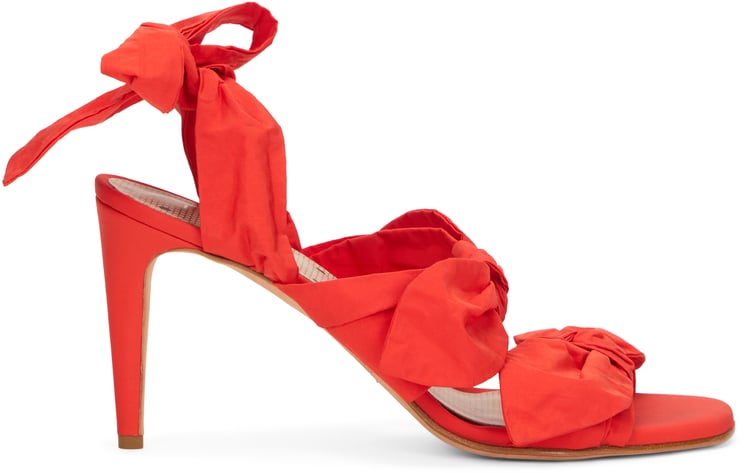Valentino Elegant orange sandals with a medium and slim heel.