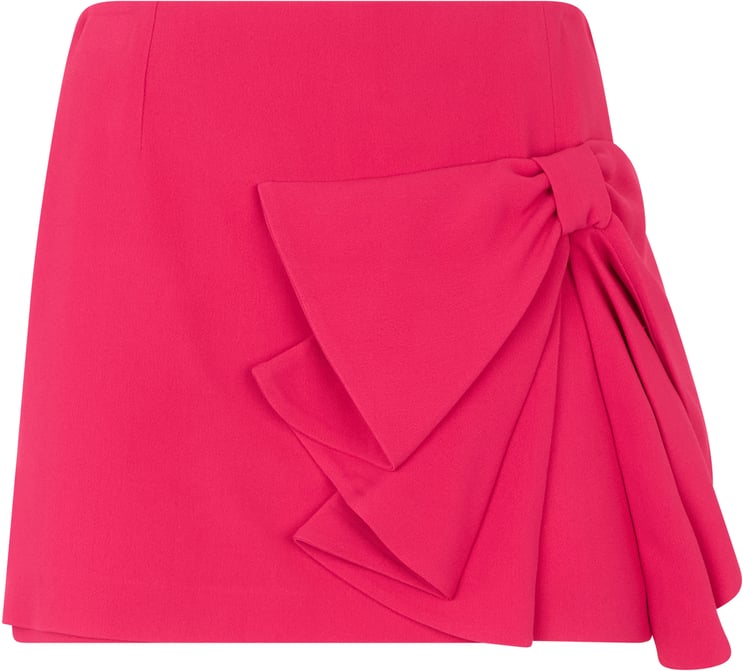 Valentino Mini fuchsia skirt with bow and elegant, lightweight drapes.