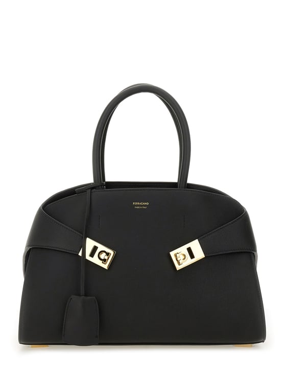 Ferragamo Structured Black Tote Bag with Curved Silhouette and Gold-tone Accents