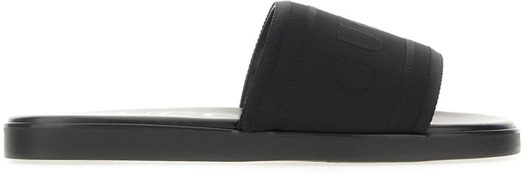 Gucci Gucci Black leather and fabric slippers