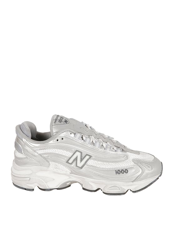 New Balance Streamlined Silver Sneakers With Textured Sole
