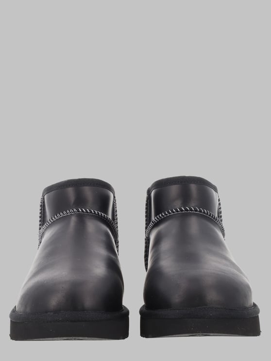 UGG Matte Black Flats with Rounded Toe and Subtle Stitching
