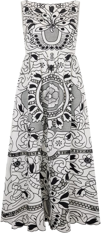 Valentino Elegant dress without sleeves in white color with black print.