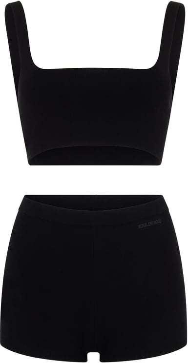 Valentino Versatile summer set made up of a top and black shorts.