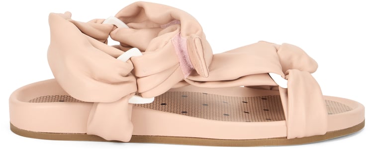 Valentino Light pink sandals with adjustable buckle.