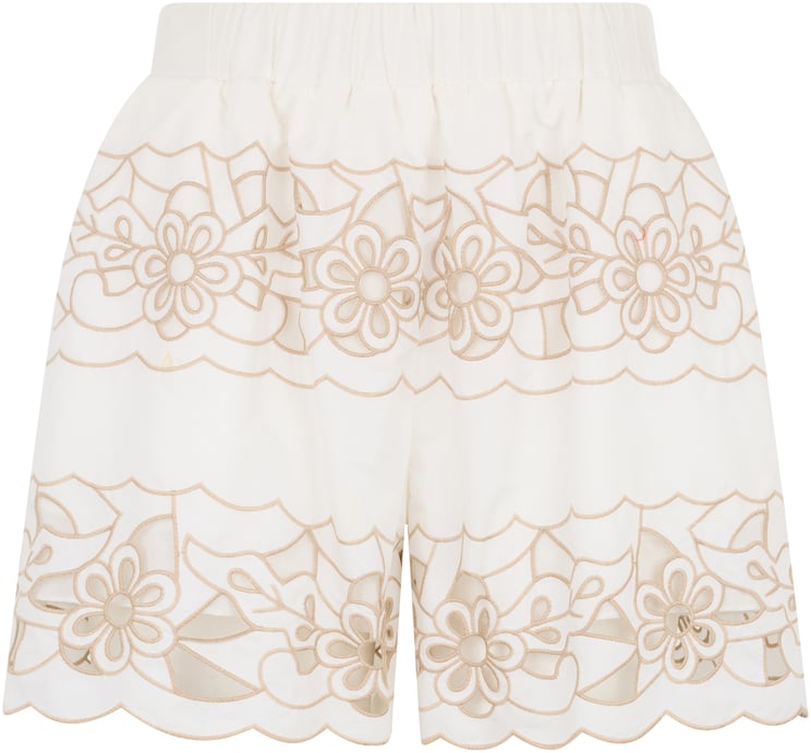 Valentino White light skirt with elegant embroidered pattern.