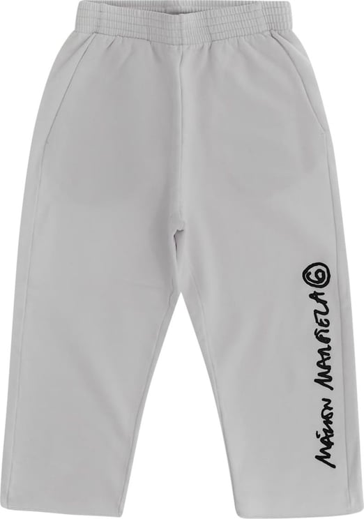 MM6 Maison Margiela White cotton cotton logo-print track pants from MM6 MAISON MARGIELA KIDS featuring logo print at the leg, elasticated waistband, slip pockets to the sides and wide leg. Wit