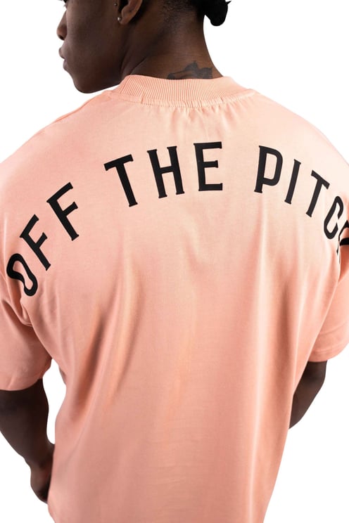 OFF THE PITCH Loose Fit Pitch T-Shirt Senior Canyon Sunset Oranje